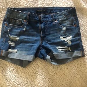 Distressed jean shorts.